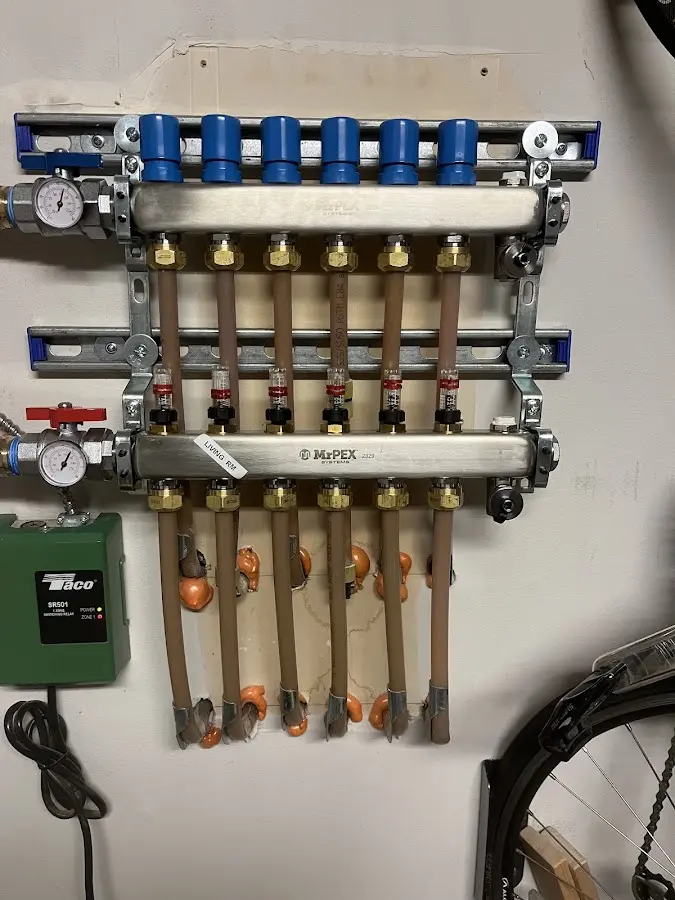 Plumber performing Gas Line Installation at a residential property in Liberty